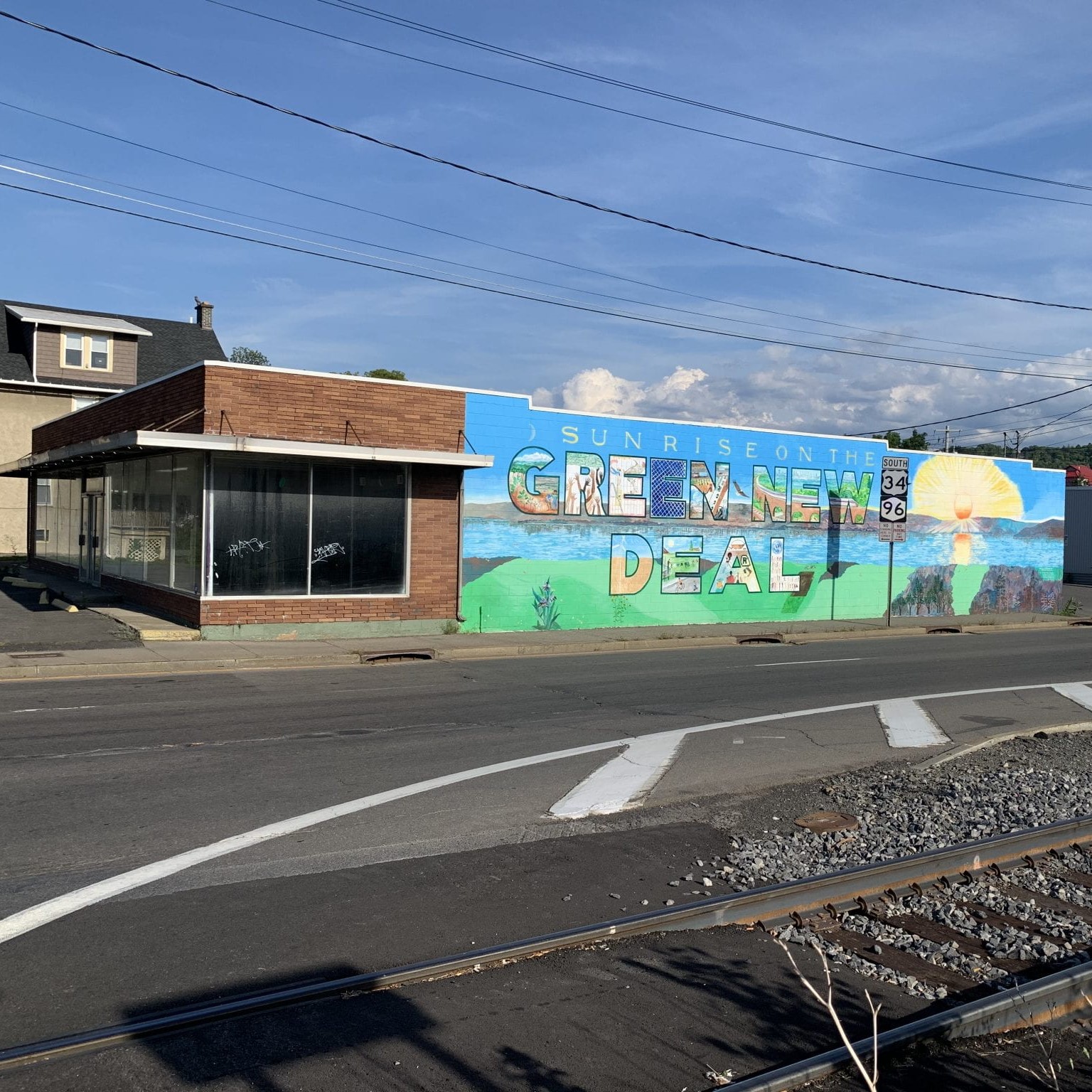 Green New Deal mural in Ithaca