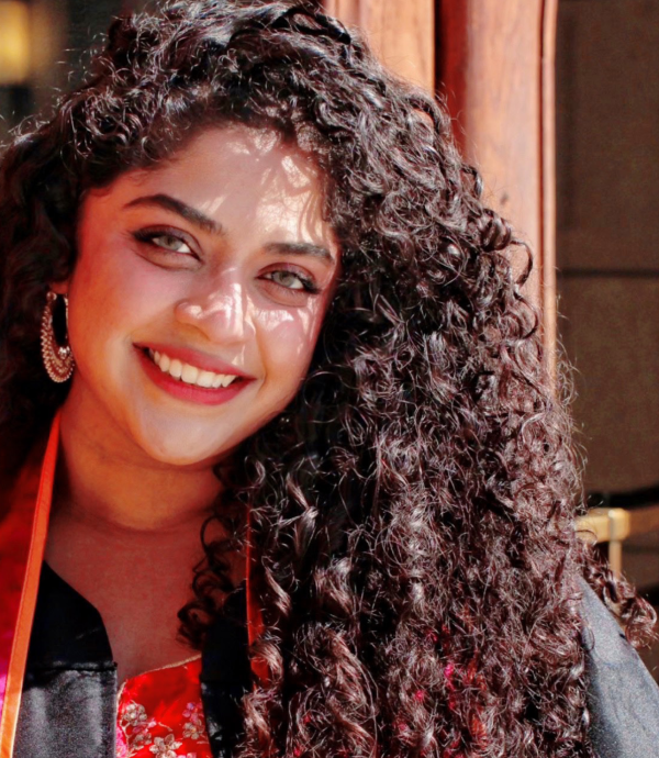 Headshot of young woman, smiling