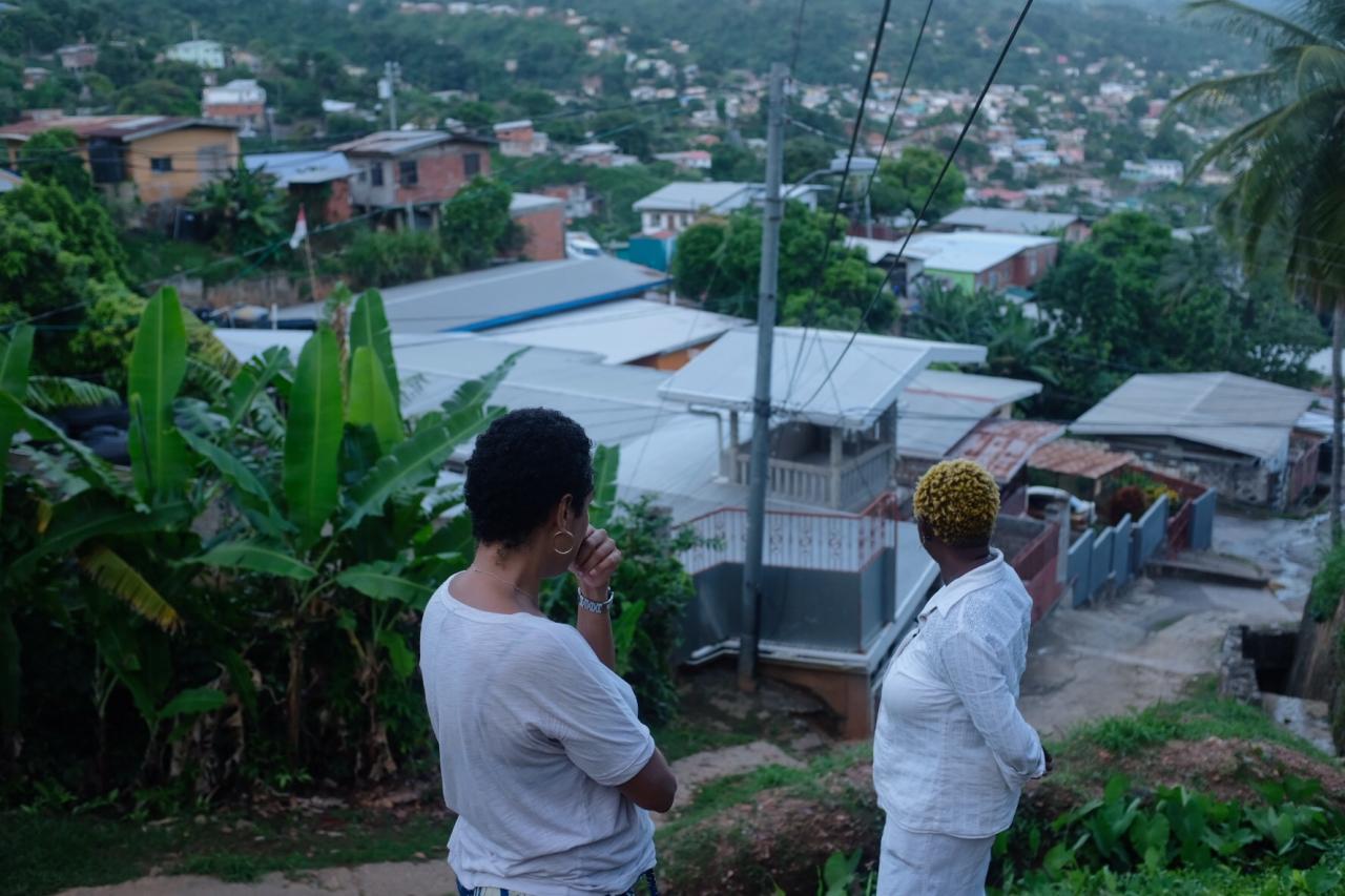 Two women viewing city from above