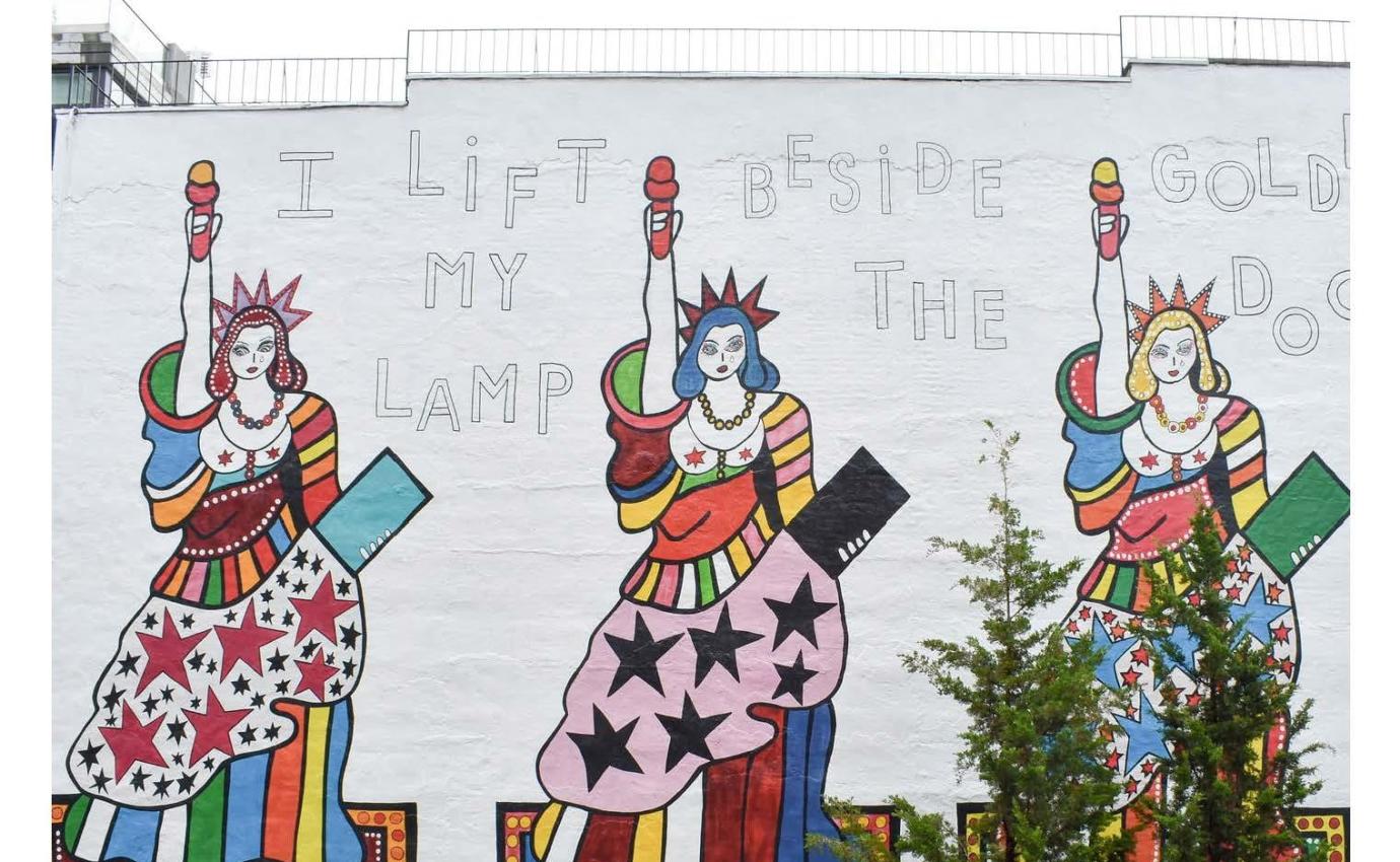 Wall with statue of liberty-themed mural