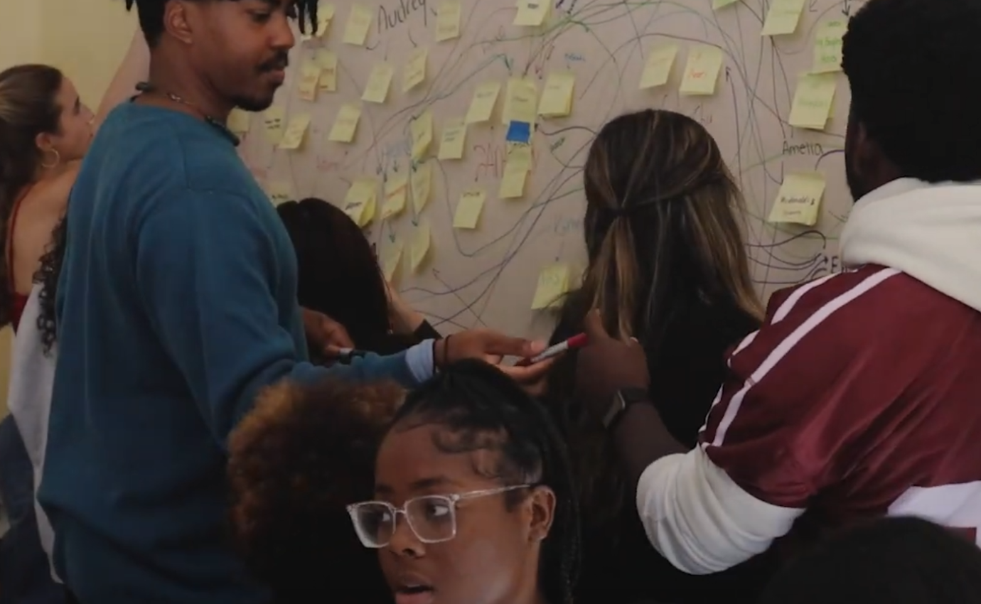 Image showing Kellen Cooks and youth in a Dreaming-on-Hudson mapping exercise