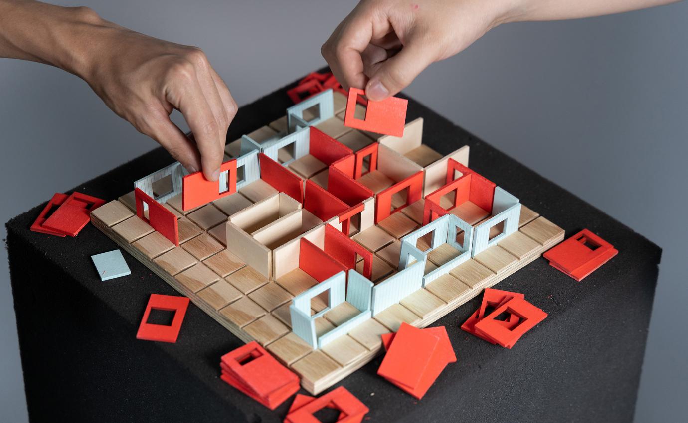 Gameboard with hands moving pieces