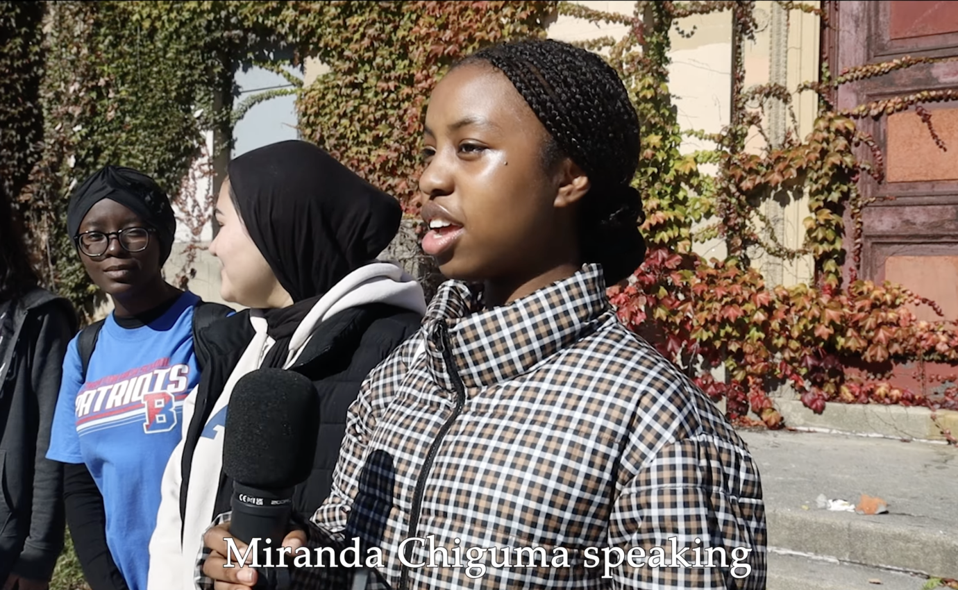 Image showing CURTA-Y high school co-researchers discussing the Masonic Temple in Binghamton